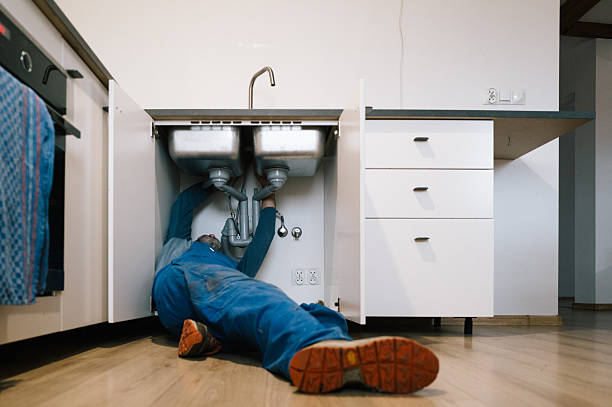 Professional Emergency Plumber technician working in Lawrence, IN